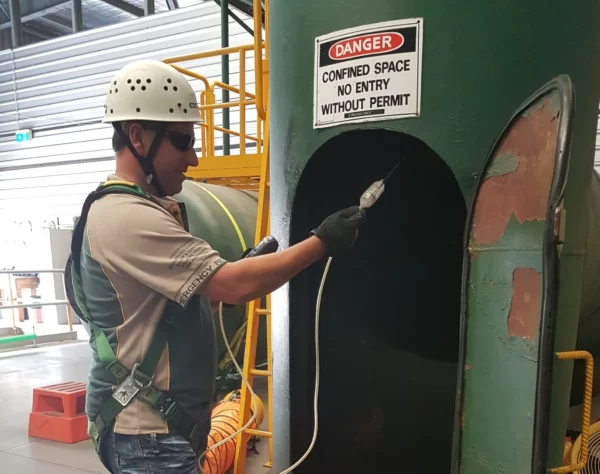 man entering a confined space